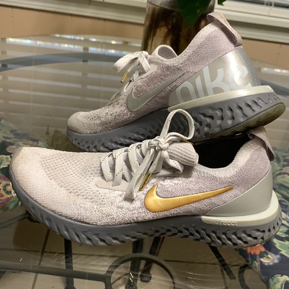 Nike Epic React flyknit sneaker gray and gold size 7.5